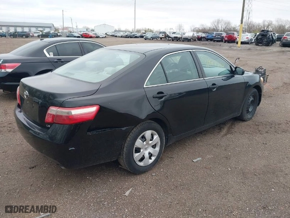 2007 Toyota Camry CE with VIN 4T1BE46K57U707992, listed as a IAAI auction lot 41927764 with 317,088 mi miles. Bid and sale history available at carsss.com. Image 4.