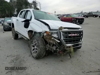 2022 GMC Canyon 4WD AT4 w/Cloth with VIN 1GTG6FEN5N1155598, listed as a Copart auction lot 41970495 with 57,572 mi miles and Salvage Title. Bid and sale history available at carsss.com. Image 11.
