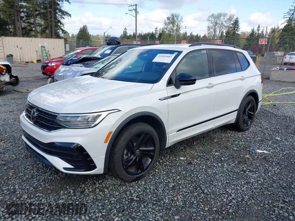 2023 Volkswagen Tiguan SE R-Line Black with VIN 3VVCB7AX3PM014446, listed as a IAAI auction lot 42016885 with 12,726 mi miles and . Bid and sale history available at DreamBid. Image 17.