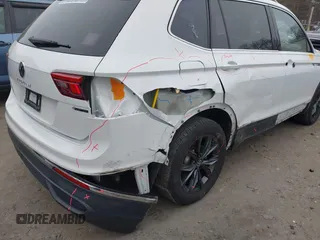 2022 Volkswagen Tiguan SE z VIN 3VV2B7AX9NM029204, wystawiony jako IAAI lot #41248800 z przebiegiem 24 450 mil mil oraz . Historia ofert i sprzedaży dostępna na DreamBid. Obrazek 18.