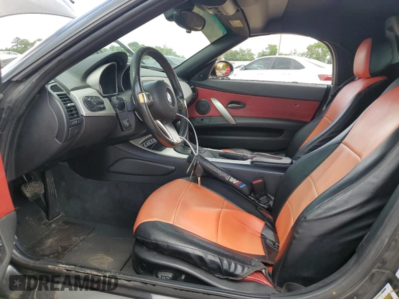 2008 BMW Z4 3.0i with VIN 4USBU33558LW74137, listed as a Copart auction lot 60290095 with 151,979 mi miles and Salvage title. Bid and sale history available at DreamBid. Image 7.
