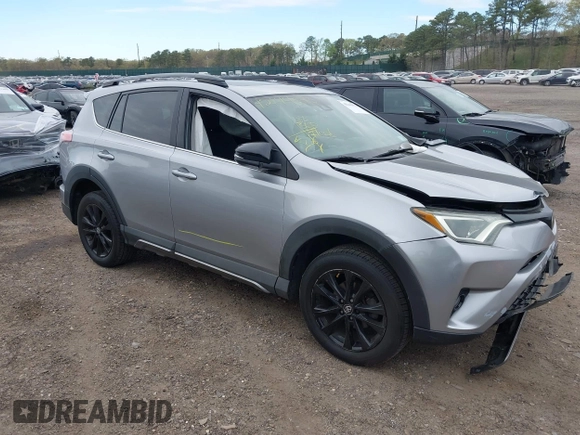 2018 Toyota RAV4 XLE with VIN 2T3RFREV1JW718474, listed as a IAAI auction lot 42144572 with 62,852 mi miles and . Bid and sale history available at DreamBid. Image 1.