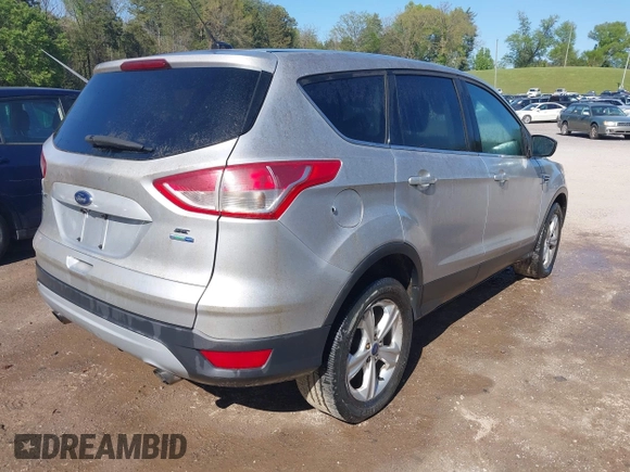 2014 Ford Escape SE with VIN 1FMCU9GX6EUB22401, listed as a IAAI auction lot 42038712 with Not Provided miles and . Bid and sale history available at carsss.com. Image 4.
