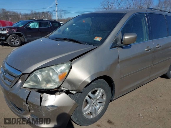 2006 Honda Odyssey EX-L z VIN 5FNRL38736B069969, wystawiony jako IAAI lot #41695311 z przebiegiem 196 218 mil mil oraz . Historia ofert i sprzedaży dostępna na DreamBid. Obrazek 6.