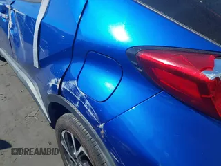 2019 Toyota C-HR XLE with VIN JTNKHMBX5K1043079, listed as a IAAI auction lot 41813367 with 77,879 mi miles and . Bid and sale history available at DreamBid. Image 20.