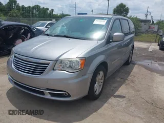 2016 Chrysler Town & Country Touring with VIN 2C4RC1BG4GR193462, listed as a IAAI auction lot 42200990 with 140,430 mi miles. Bid and sale history available at carsss.com. Image 2.