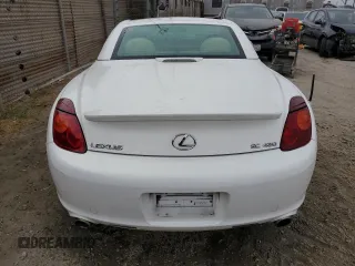 2004 Lexus SC 430 with VIN JTHFN48Y040054660, listed as a Copart auction lot 64510515 with 79,452 mi miles and Salvage title. Bid and sale history available at DreamBid. Image 6.