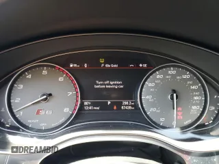 2017 Audi S6 Premium Plus z VIN WAUFFAFCXHN012281, wystawiony jako Copart lot #53571455 z przebiegiem 67 439 mil mil oraz Szkoda całkowita • Salvage title. Historia ofert i sprzedaży dostępna na DreamBid. Obrazek 9.