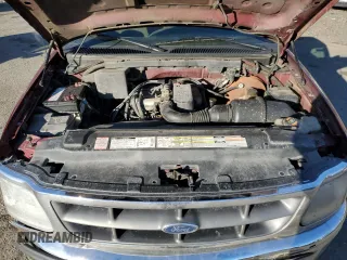 1997 Ford F-150 с VIN 1FTDF1721VNA54544, выставлен на аукционе Copart как лот 85661394 с пробегом 221 536 миль миль и Списание • Salvage title. История ставок и продаж доступна на DreamBid. Изображение 13.