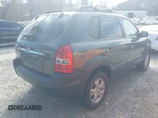 2007 Hyundai Tucson SE with VIN KM8JN12DX7U635740, listed as a IAAI auction lot 41648027 with 169,967 mi miles. Bid and sale history available at carsss.com. Image 4.