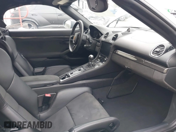 2023 Porsche 718 Spyder with VIN WP0CC2A83PS222034, listed as a IAAI auction lot 41222380 with 5,932 mi miles and . Bid and sale history available at DreamBid. Image 5.