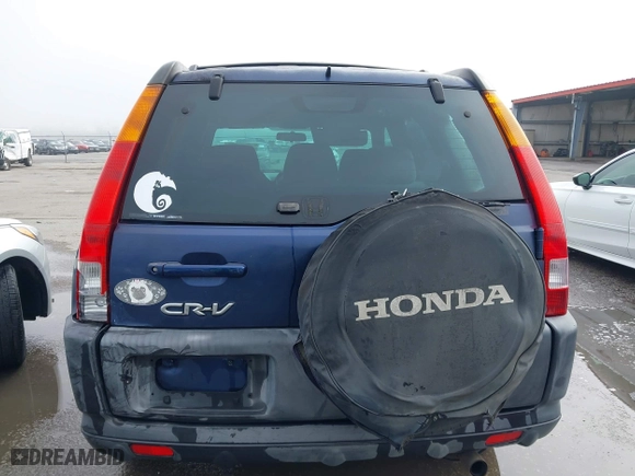 2003 Honda CR-V EX with VIN SHSRD78863U110869, listed as a IAAI auction lot 41612374 with 221,200 mi miles. Bid and sale history available at carsss.com. Image 16.