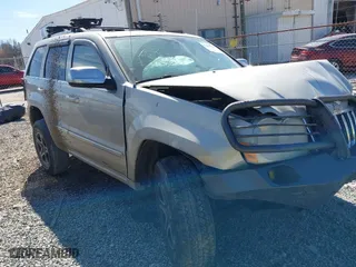 2006 Jeep Grand Cherokee Overland with VIN 1J8HR68256C358437, listed as a IAAI auction lot 41662320 with 172,296 mi miles. Bid and sale history available at carsss.com. Image 1.