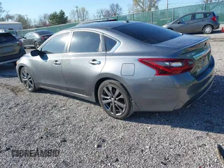 2018 Nissan Altima 2.5 SR with VIN 1N4AL3AP7JC240029, listed as a IAAI auction lot 41883209 with 77,190 mi miles. Bid and sale history available at carsss.com. Image 3.