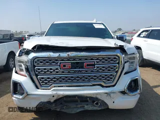2021 GMC Sierra 1500 Denali z VIN 3GTU9FEL1MG349215, wystawiony jako IAAI lot #42585810 z przebiegiem 97 465 mil mil oraz . Historia ofert i sprzedaży dostępna na DreamBid. Obrazek 6.