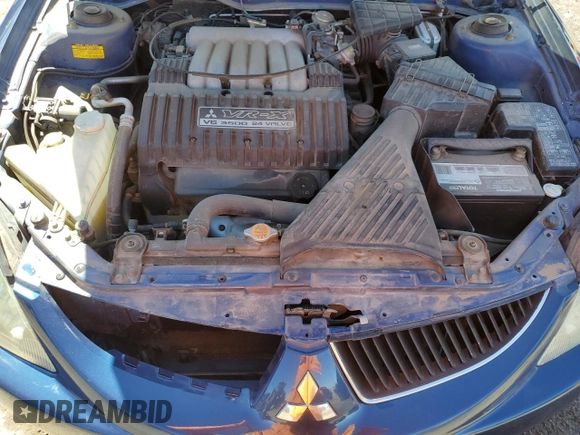 2004 Mitsubishi Diamante z VIN 6MMAP87P64T002041, wystawiony jako Copart lot #48525945 z przebiegiem 121 570 mil mil oraz Szkoda całkowita • Salvage title. Historia ofert i sprzedaży dostępna na DreamBid. Obrazek 11.