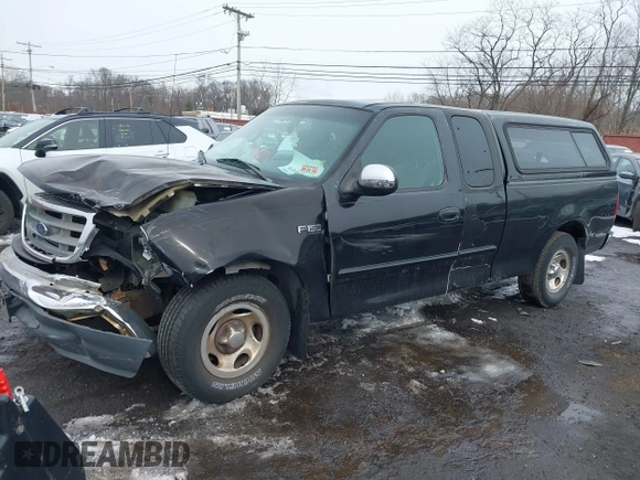 2001 Ford F-150 XL z VIN 1FTZX17201NB75918, wystawiony jako IAAI lot #41541039 z przebiegiem 225 005 mil mil oraz . Historia ofert i sprzedaży dostępna na DreamBid. Obrazek 20.