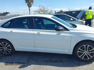 2023 Volkswagen Jetta Sport with VIN 3VWBM7BU5PM051794, listed as a IAAI auction lot 42023152 with 31,826 mi miles and . Bid and sale history available at DreamBid. Image 14.