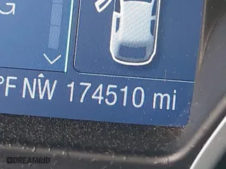 2012 Ford Focus SEL with VIN 1FAHP3H23CL348356, listed as a IAAI auction lot 42041001 with 174,510 mi miles. Bid and sale history available at carsss.com. Image 7.
