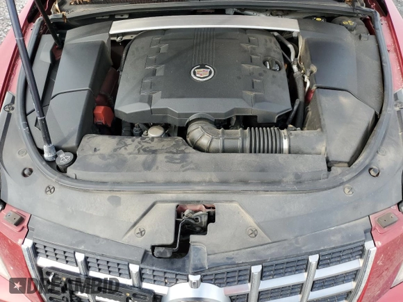 2012 Cadillac CTS Performance with VIN 1G6DJ5E34C0138842, listed as a Copart auction lot 77975404 with 120,883 mi miles and Salvage Title. Bid and sale history available at DreamBid. Image 11.