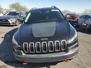 2015 Jeep Cherokee Trailhawk with VIN 1C4PJMBS8FW699319, listed as a Copart auction lot 61612245 with 173,581 mi miles and Clean title. Bid and sale history available at DreamBid. Image 5.