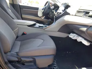 2023 Toyota Camry LE z VIN 4T1C11AK2PU120803, wystawiony jako IAAI lot #42060384 z przebiegiem 38 897 mil mil oraz . Historia ofert i sprzedaży dostępna na DreamBid. Obrazek 5.