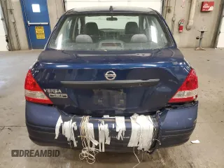 2009 Nissan Versa 1.6 z VIN 3N1CC11E49L458857, wystawiony jako Copart lot #59195275 z przebiegiem 100 351 mil mil oraz Szkoda całkowita • Salvage title. Historia ofert i sprzedaży dostępna na DreamBid. Obrazek 6.