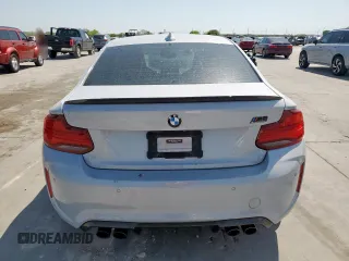 2020 BMW M2 Competition z VIN WBS2U7C06L7E16840, wystawiony jako Copart lot #50235865 z przebiegiem 55 240 mil mil oraz Szkody całkowita. Historia ofert i sprzedaży dostępna na DreamBid. Obrazek 6.