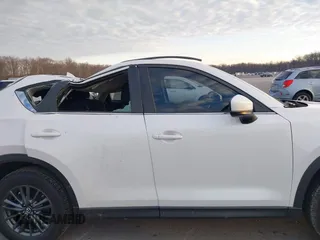 2019 Mazda CX-5 Sport with VIN JM3KFABMXK1655302, listed as a IAAI auction lot 41901293 with 140,369 mi miles and . Bid and sale history available at DreamBid. Image 13.