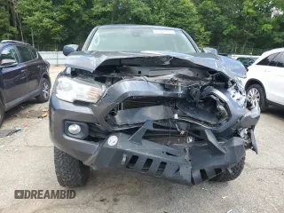 2022 Toyota Tacoma SR with VIN 3TYAX5GN2NT046114, listed as a Copart auction lot 61281875 with 57,726 mi miles and Salvage title. Bid and sale history available at DreamBid. Image 5.