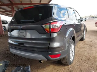 2017 Ford Escape SE with VIN 1FMCU0G99HUB83193, listed as a IAAI auction lot 41777263 with 120,449 mi miles. Bid and sale history available at carsss.com. Image 4.