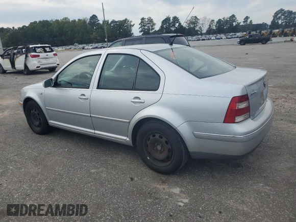 2004 Volkswagen Jetta GL with VIN 3VWRR69M34M108439, listed as a Copart auction lot 74029704 with 296,984 mi miles and Salvage title. Bid and sale history available at DreamBid. Image 2.