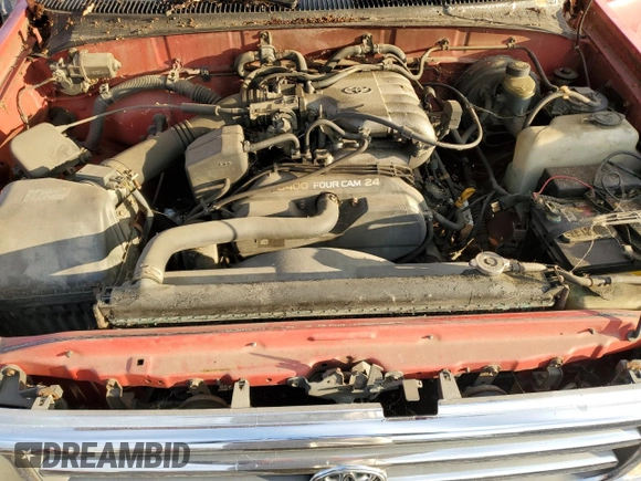 1995 Toyota T100 z VIN JT4VD21E7S0004632, wystawiony jako Copart lot #79314784 z przebiegiem 248 834 mil mil oraz Tytuł czysty. Historia ofert i sprzedaży dostępna na DreamBid. Obrazek 11.