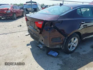 2014 Kia Optima LX with VIN 5XXGM4A70EG273483, listed as a IAAI auction lot 42402765 with 129,770 mi miles and . Bid and sale history available at DreamBid. Image 6.