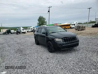 2016 Jeep Compass Sport with VIN 1C4NJDBBXGD598240, listed as a Copart auction lot 57887495 with 152,932 mi miles and Salvage title. Bid and sale history available at DreamBid. Image 15.