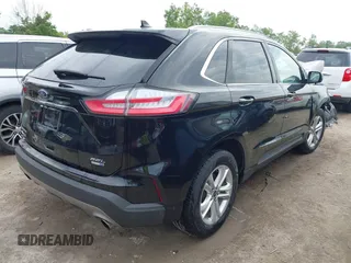 2019 Ford Edge SEL z VIN 2FMPK4J96KBC18745, wystawiony jako IAAI lot #42488750 z przebiegiem 63 473 mil mil oraz . Historia ofert i sprzedaży dostępna na DreamBid. Obrazek 4.
