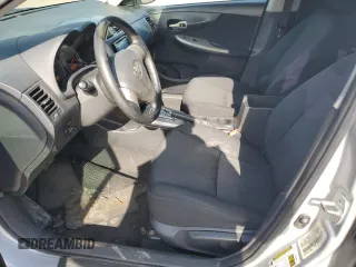2010 Toyota Corolla with VIN 1NXBU4EE7AZ227815, listed as a Copart auction lot 61234235 with 167,828 mi miles and Salvage title. Bid and sale history available at DreamBid. Image 7.