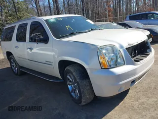 2013 GMC Yukon XL Denali with VIN 1GKS2MEF9DR131229, listed as a IAAI auction lot 41605721 with 101,978 mi miles. Bid and sale history available at carsss.com. Image 1.