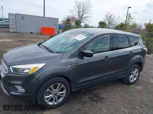 2017 Ford Escape SE with VIN 1FMCU9GD1HUC27843, listed as a IAAI auction lot 42009686 with 111,290 mi miles and . Bid and sale history available at DreamBid. Image 14.