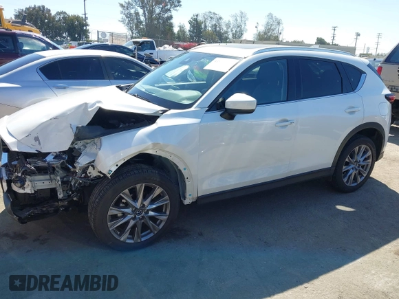 2020 Mazda CX-5 Grand Touring with VIN JM3KFADM0L1838495, listed as a IAAI auction lot 41991566 with 32,021 mi miles. Bid and sale history available at carsss.com. Image 14.