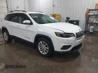 2019 Jeep Cherokee Latitude with VIN 1C4PJLCX2KD205286, listed as a IAAI auction lot 41276437 with 112,333 mi miles. Bid and sale history available at carsss.com. Image 1.