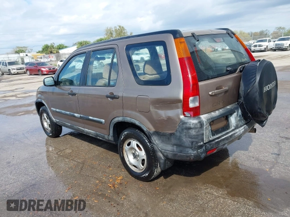 2003 Honda CR-V LX with VIN JHLRD68513C009276, listed as a IAAI auction lot 41563452 with 240,519 mi miles and . Bid and sale history available at DreamBid. Image 3.
