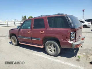 2001 Chevrolet Tahoe LT with VIN 1GNEC13T71R164164, listed as a Copart auction lot 60066165 with 234,506 mi miles and Salvage title. Bid and sale history available at DreamBid. Image 2.