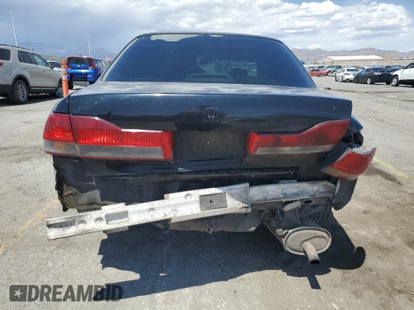 2001 Honda Accord LX z VIN JHMCG66501C014686, wystawiony jako Copart lot #55479965 z przebiegiem 316 271 mil mil oraz Szkoda całkowita • Salvage title. Historia ofert i sprzedaży dostępna na DreamBid. Obrazek 6.