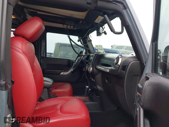 2013 Jeep Wrangler Rubicon 10th Anniversary with VIN 1C4BJWCG2DL651815, listed as a IAAI auction lot 41643919 with 98,297 mi miles and . Bid and sale history available at DreamBid. Image 5.