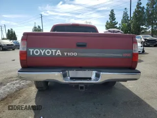 1996 Toyota T100 SR5 z VIN JT4TN14D7T0017707, wystawiony jako Copart lot #75676624 z przebiegiem 246 564 mil mil oraz Szkody całkowita. Historia ofert i sprzedaży dostępna na DreamBid. Obrazek 6.