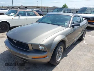 2005 Ford Mustang Deluxe with VIN 1ZVFT80NX55145615, listed as a IAAI auction lot 42511360 with 236,242 mi miles and . Bid and sale history available at DreamBid. Image 2.