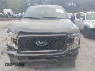 2018 Ford F-150 XL with VIN 1FTEW1C50JFD23545, listed as a IAAI auction lot 41838209 with 129,906 mi miles and . Bid and sale history available at DreamBid. Image 12.