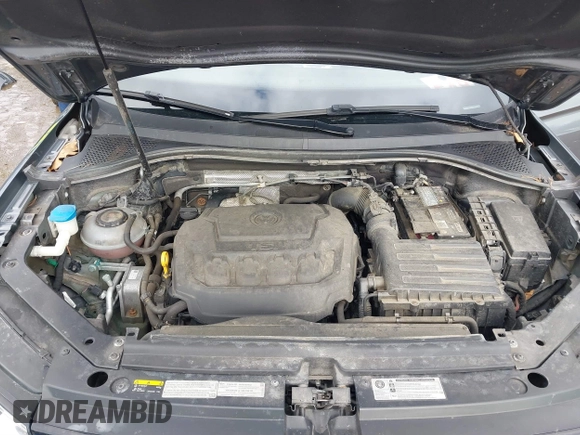 2018 Volkswagen Tiguan S with VIN 3VV0B7AX2JM011628, listed as a IAAI auction lot 41685841 with 129,484 mi miles and . Bid and sale history available at DreamBid. Image 10.