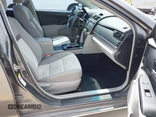 2014 Toyota Camry L with VIN 4T4BF1FKXER379158, listed as a IAAI auction lot 42050926 with 88,060 mi miles and . Bid and sale history available at DreamBid. Image 5.